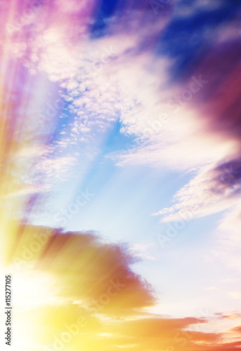 Vertical dramatic cloudscape with sun rays background