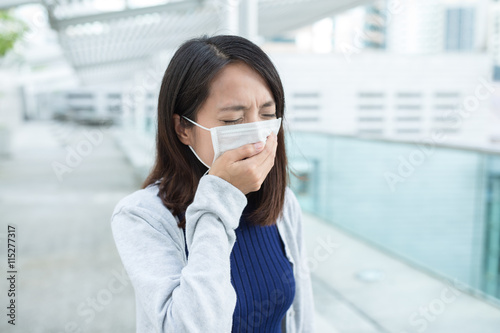 Woman getting sick at outdoor