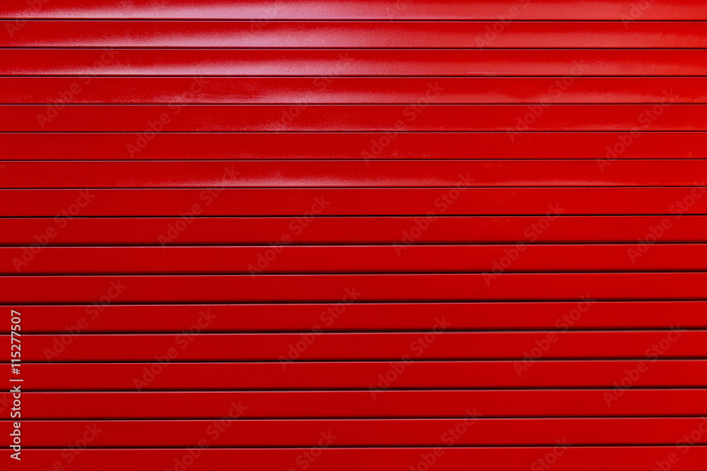 Red painted metal garage door or wall. Red garage door with black stripes.  Black and red metal wall background. Stock Photo | Adobe Stock