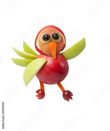Waving bird made of fruits on clear background