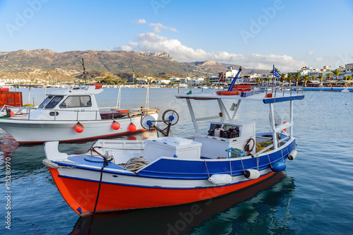 Beautiful fishing boat staing parked at harbour of Sitia town on Crete island, Greece