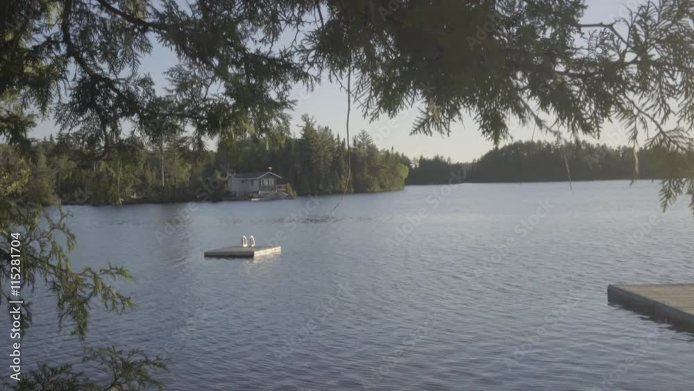 fishing boat on a small canadian lake in ontario relaxing summer vacations fishing boat on a small canadian lake in ontario relaxing summer vacations
