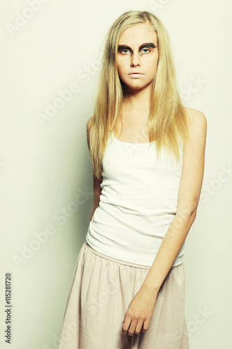 fashion model posing on light background 