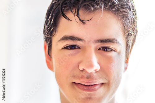 close up of face of young teen boy