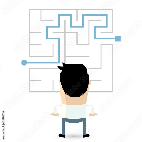 businessman standing in front of a maze with a solution to success