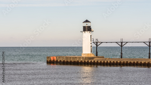 Obraz na plátně North Pier Outer Lighthouse and catwalk, in Lake Michigan, at St