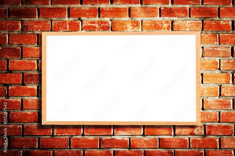 Mock up blank wooden picture frame on brick wall Mock up blank wooden picture frame on brick wall