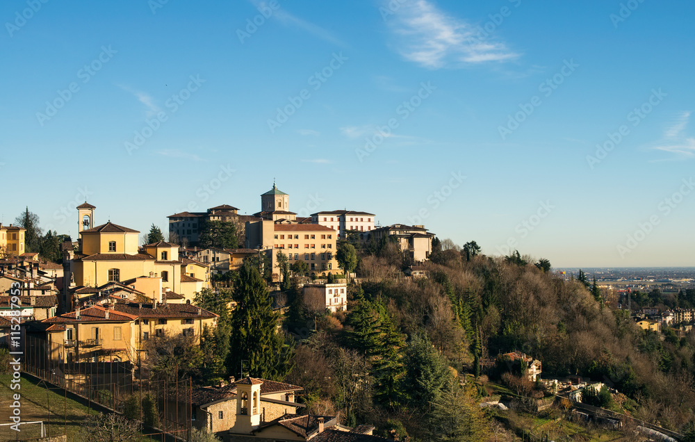 View over Citta Alta or Old Town buildings in the ancient city of Bergamo, Lombardia, Italy on a clear day