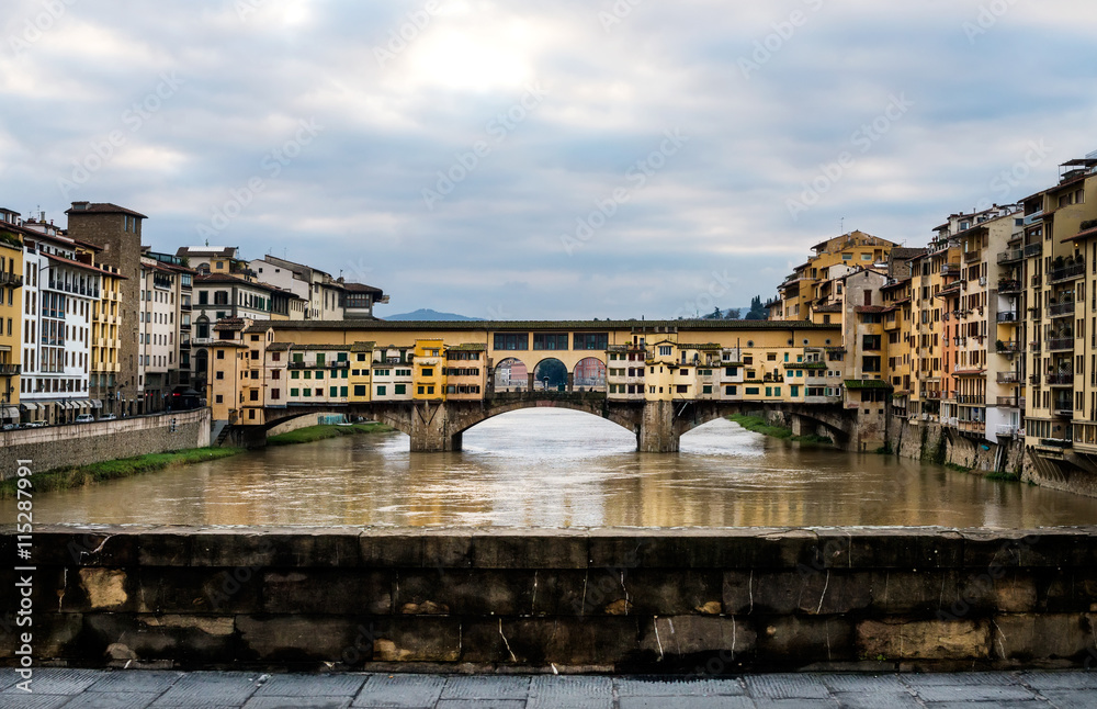 Perspective view of Old Ponte Vecchio Bridge on dull day, Florence, Italy