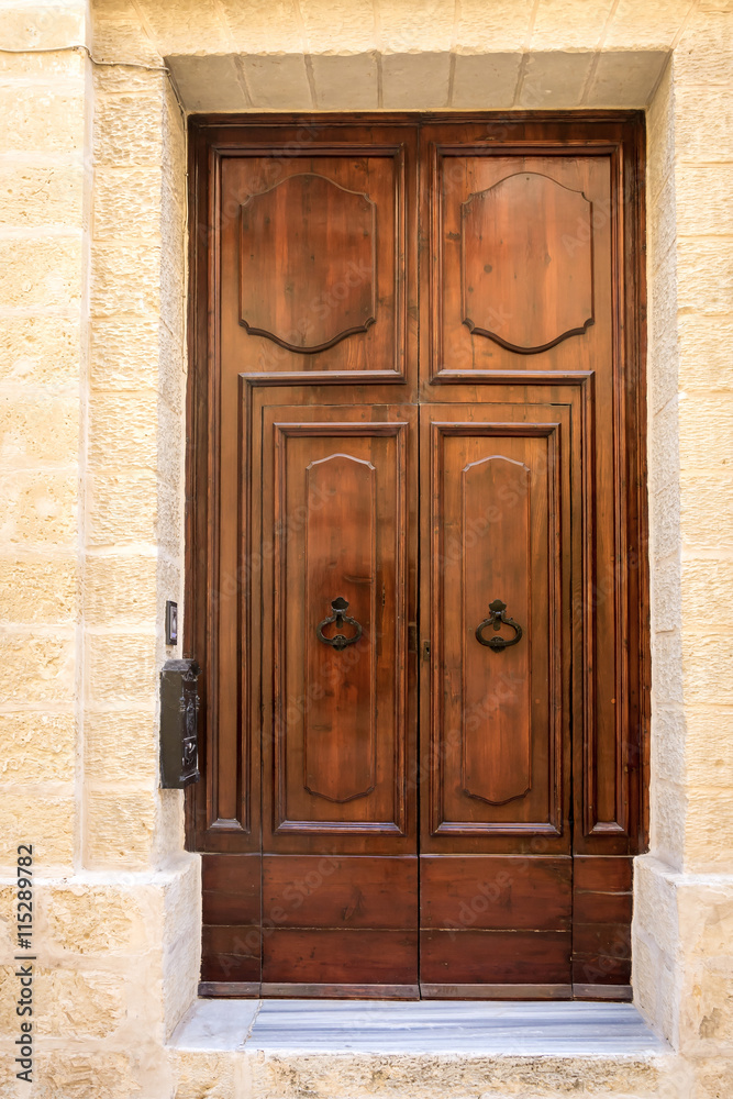 Brown door in Malta