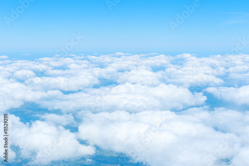 Skyline View above the Clouds from airplane © lstudio