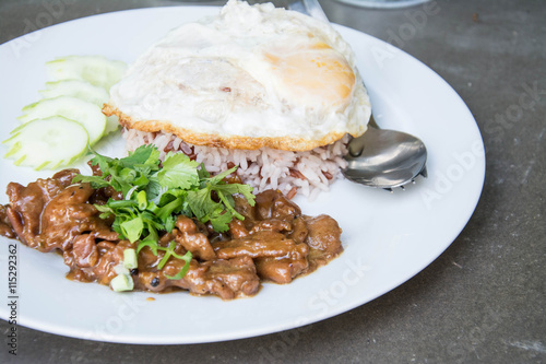 Braised pork on rice with fried egg