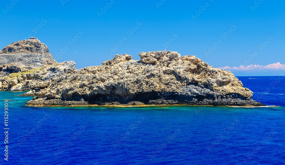 Rocks in the sea of the island of Rhodes Greece