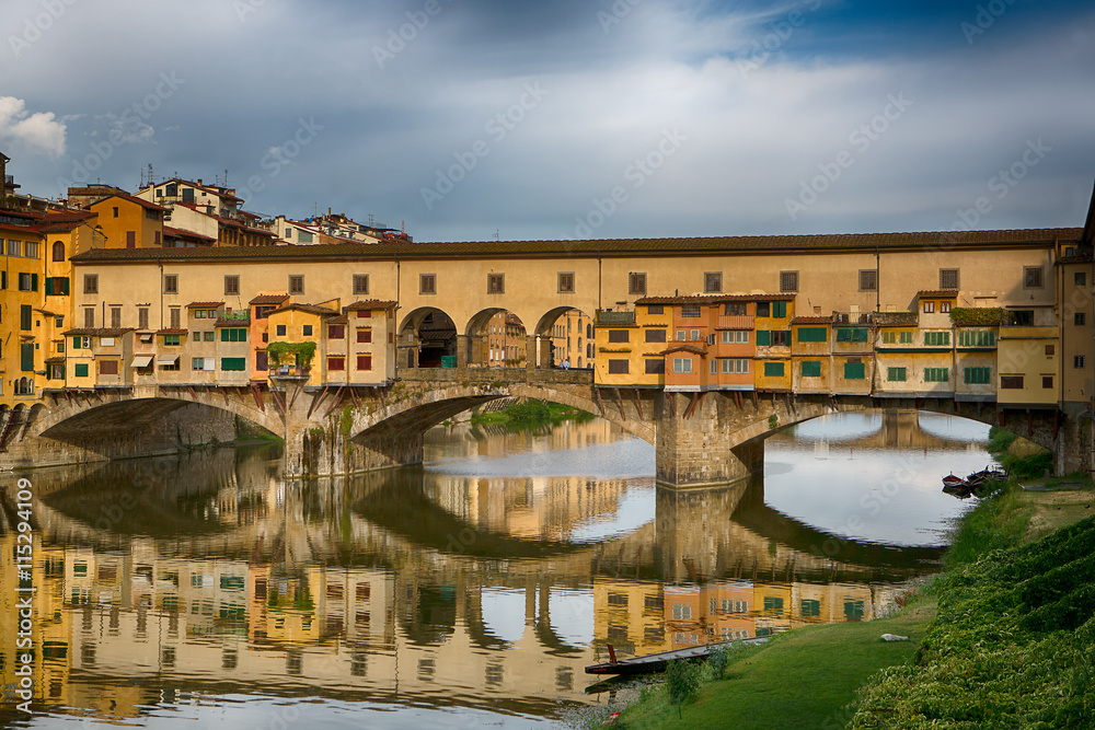 Ponte Vecchio bridge over the river Arno. Bridge was opened in 1345 and is one of the biggest tourist attractions in Florence. Italy