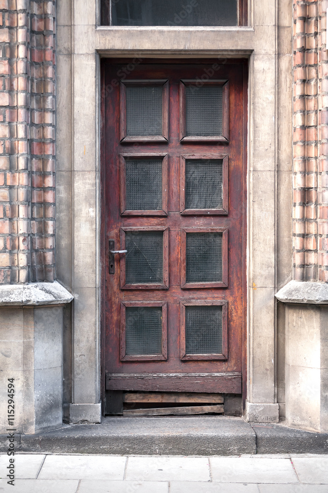 Old vintage brown wooden door. Home.