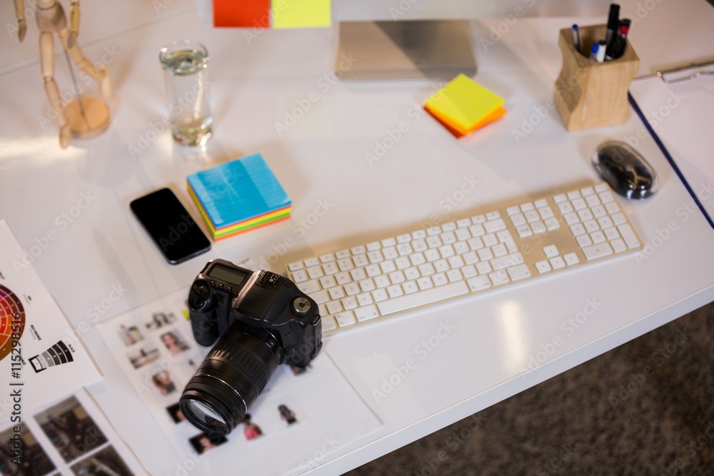 Camera by keyboard at desk
