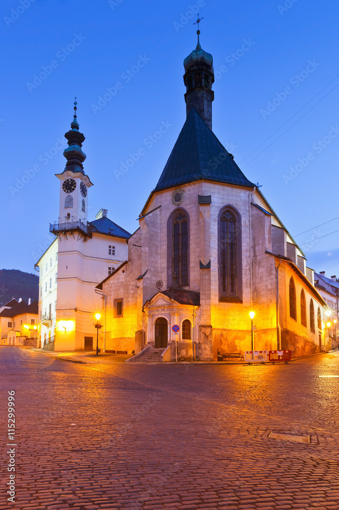 Town hall and a church in the old town of Banska Stiavnica, Slovakia. Town hall and a church in the old town of Banska Stiavnica, Slovakia.