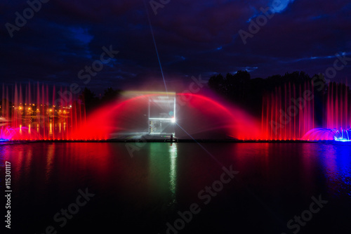 Vászonkép Night magic show of fountains on the central waterfront Roshen