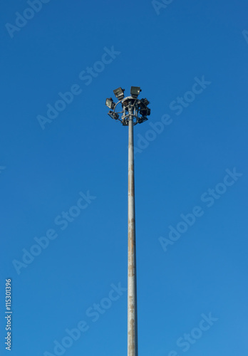 Spotlight Pole with blue sky background