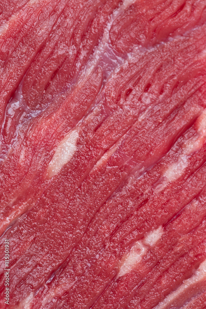 A piece of fresh marbled beef steak for cooking.
