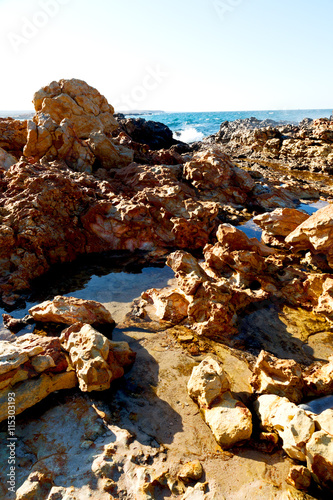 in oman coastline sea ocean   gulf rock and beach relax near sky © lkpro