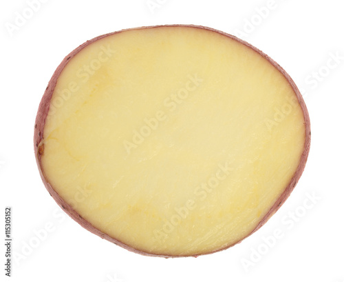 Single slice of red potato on a white background.