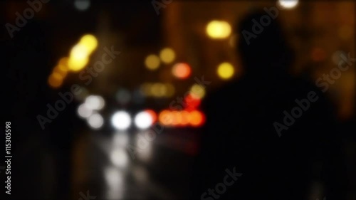 Wallpaper Mural Pedestrians walking in the center of Prague city street at night with light illumination, and traffic of cars and trams. Blurred defocused background. Torontodigital.ca