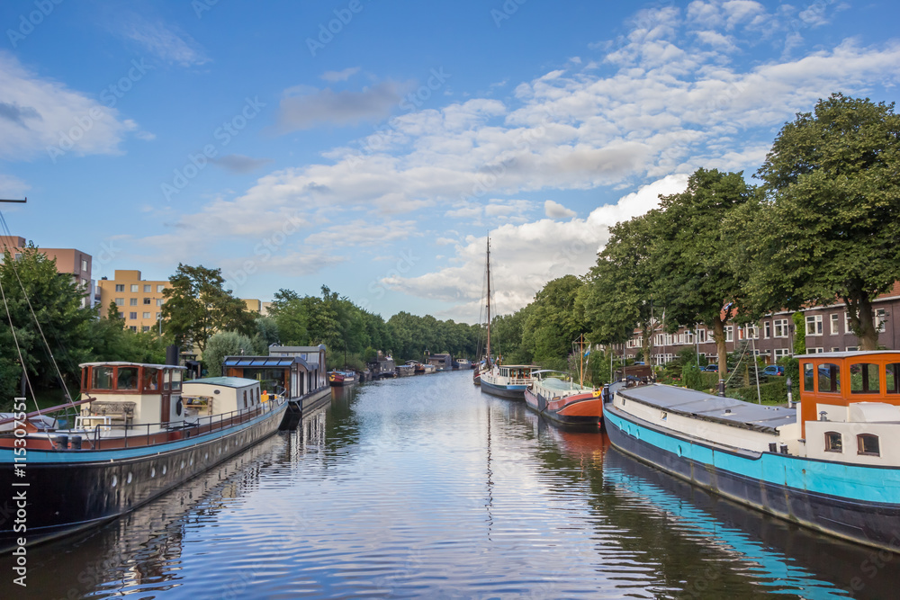 Canal with ships in the center of Groningen