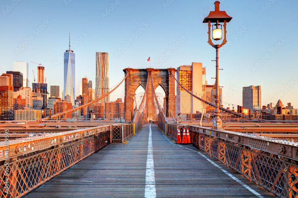 Naklejka premium New York City Brooklyn Bridge in Manhattan closeup with skyscrap
