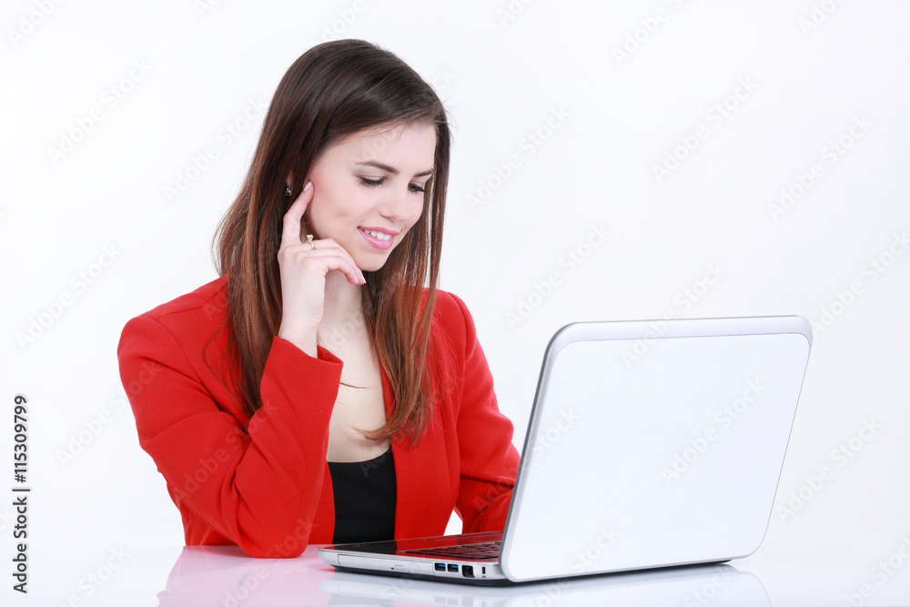 Business smiling woman working on laptop at office Business smiling woman working on laptop at office