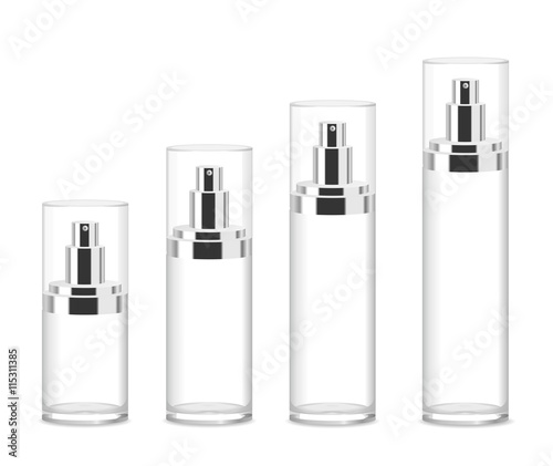 Four transparent cosmetic bottles