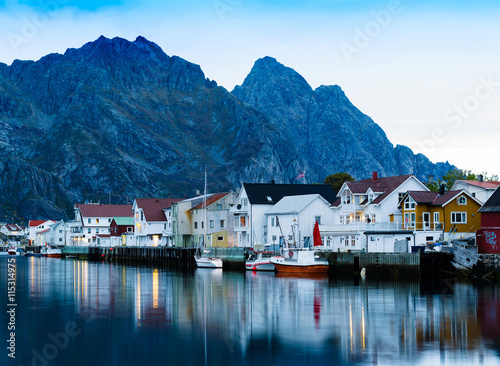 Horizontal vivid Norway town mountain pier reflections lights ba photo