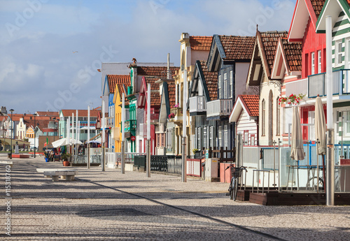 Traditional street with striped houses, Costa Nova, Aveiro, Portugal
