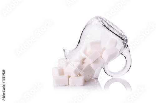 Sugar cubes in a glass jug