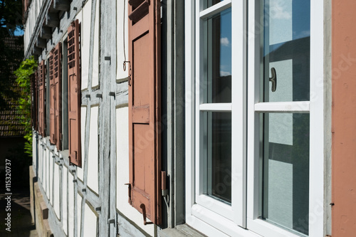 Detail Fenster und Fensterladen an einem Fachwerkhaus photo