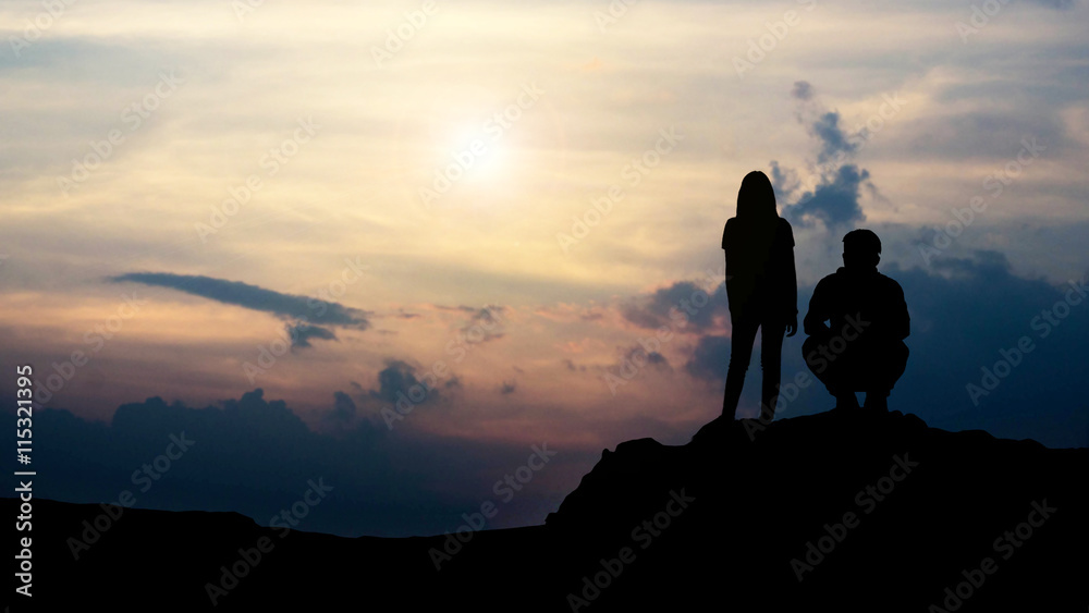 silhouette of love guy and girl against sunset