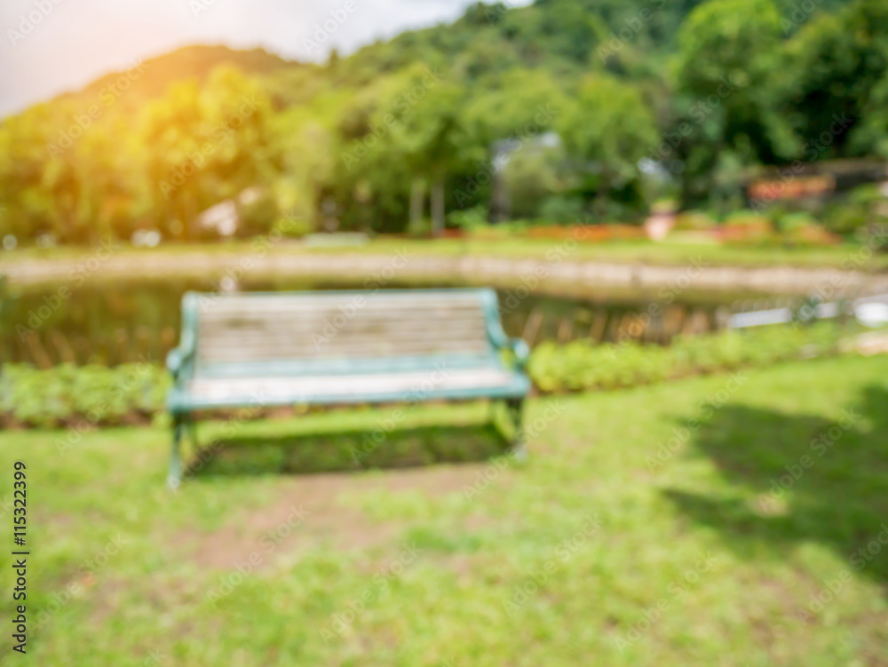 blur bench in the park summer time natural background