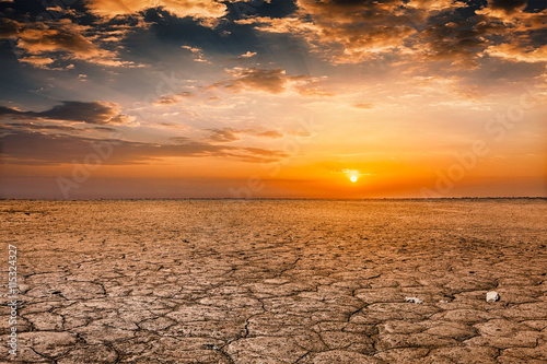 Cracked earth soil sunset landscape