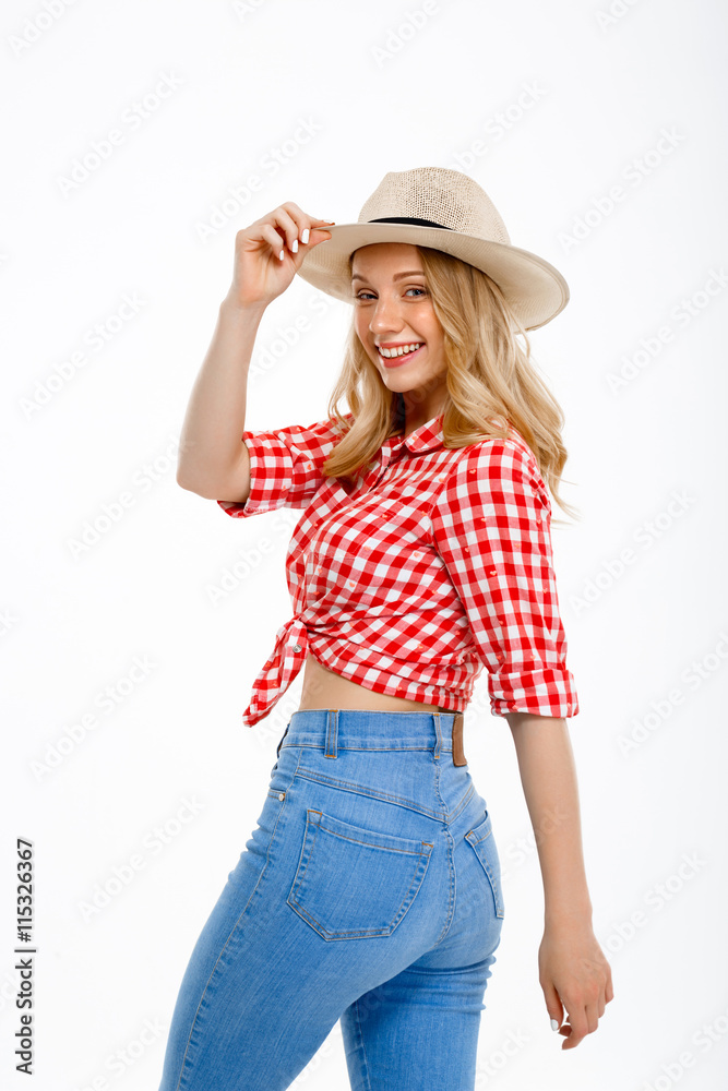 Portrait of beautiful country girl smiling over white background. Portrait of beautiful country girl smiling over white background.
