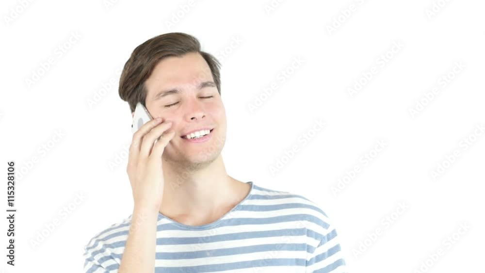 Young man smiling and talking on smart phone Young man smiling and talking on smart phone