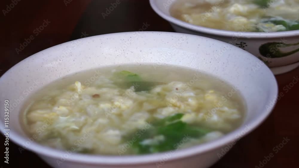 Chinese, Taiwanese plain food, egg scramble with boiled rice hot soup Chinese, Taiwanese plain food, egg scramble with boiled rice hot soup