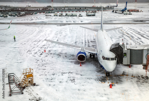 Passenger Airplane on airfield winter