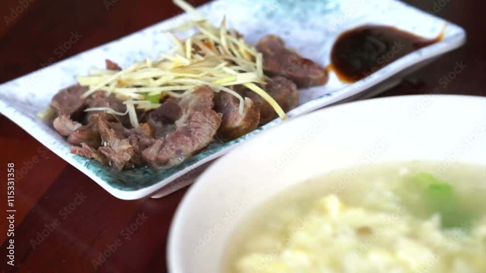 Chinese Taiwanese ginger pork with soy sauce and boiled rice egg soup, local food Chinese Taiwanese ginger pork with soy sauce and boiled rice egg soup, local food