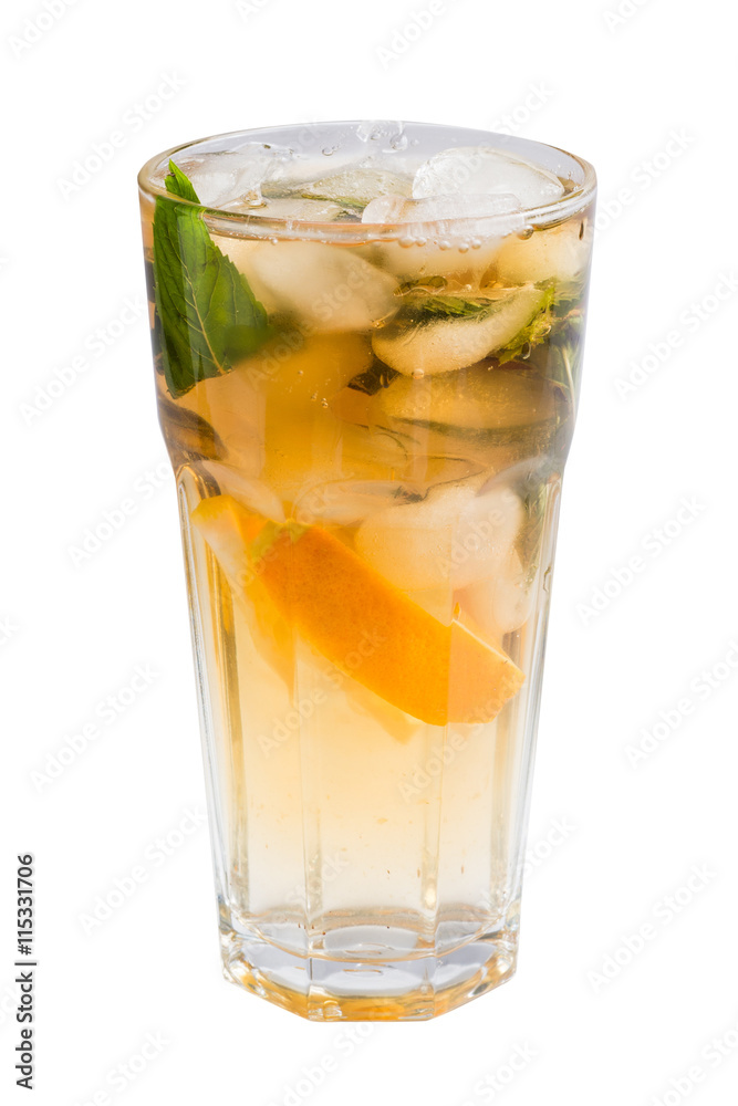 glass of cold fruit cocktail with ice, mint and pieces of fruit on a white background glass of cold fruit cocktail with ice, mint and pieces of fruit on a white background