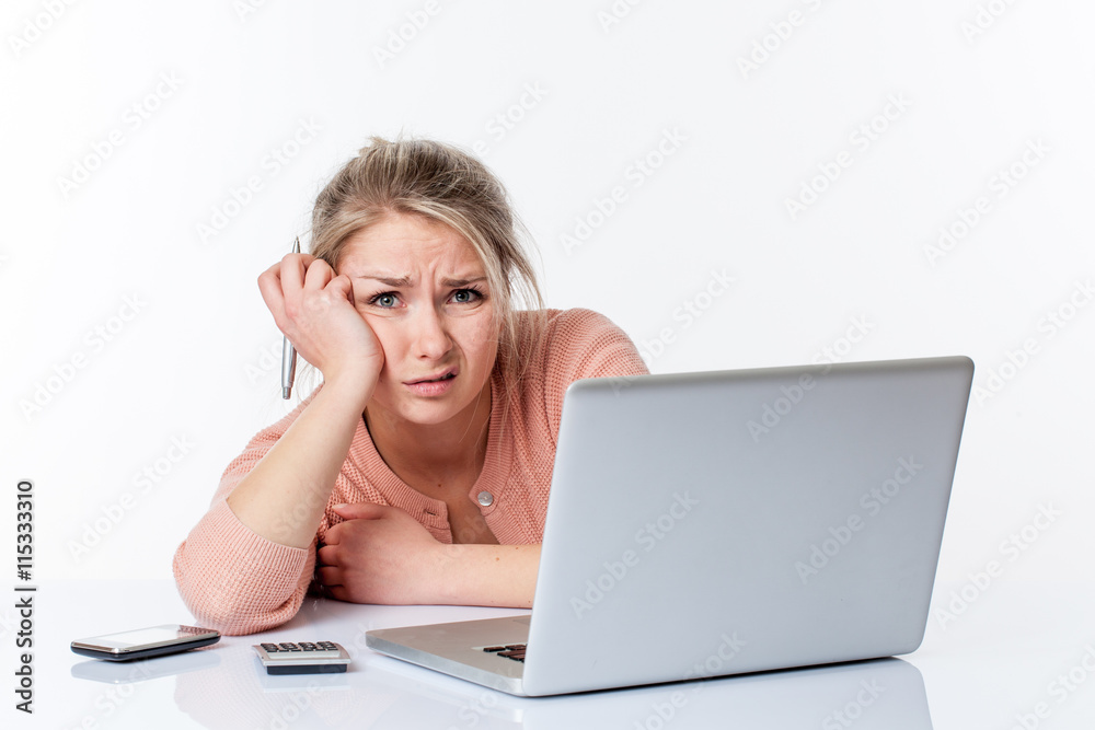 unhappy young woman working hard, looking disgusted and scared unhappy young woman working hard, looking disgusted and scared