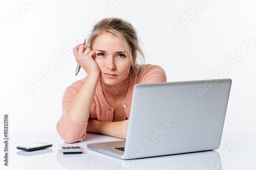 thinking beautiful girl studying or working hard on her computer