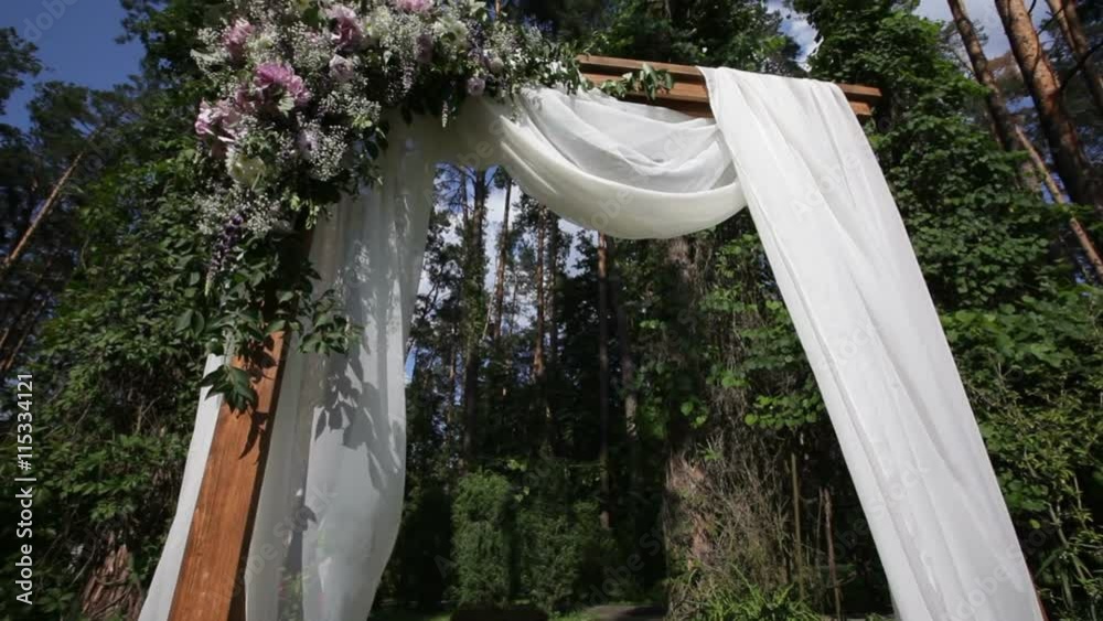 decor of flowers on a wedding ceremony in the park decor of flowers on a wedding ceremony in the park