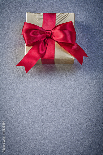 Present box on grey background copy space holidays concept