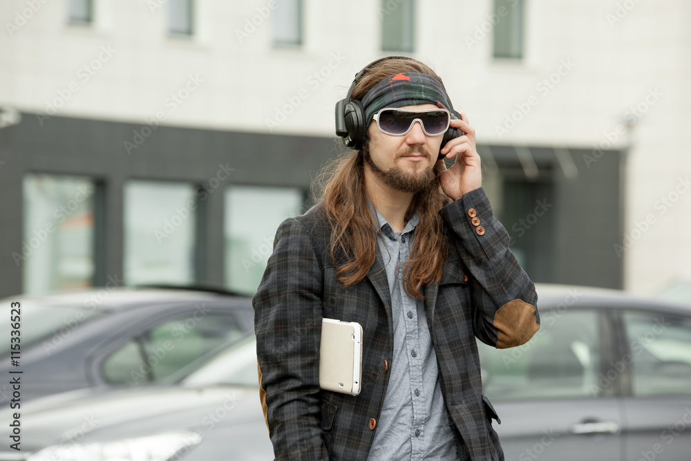 Fototapeta premium Young hipster guy with the tablet.