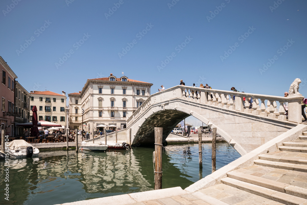 Typical bridge across a canal in Chioggia, Venice, Italy.